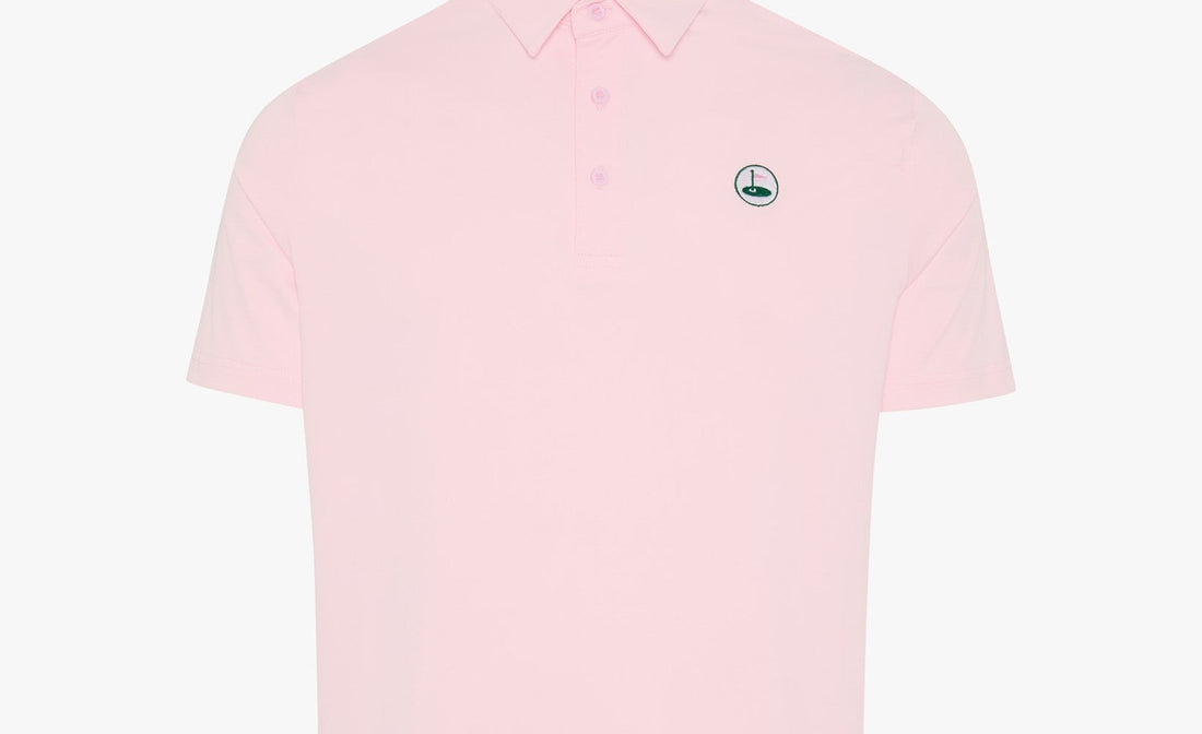 The Brancaster pink performance golf polo by Palvento