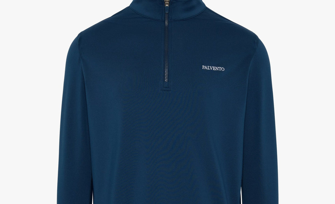 Navy Palvento performance quarter zip illustrating refined off-course golf style