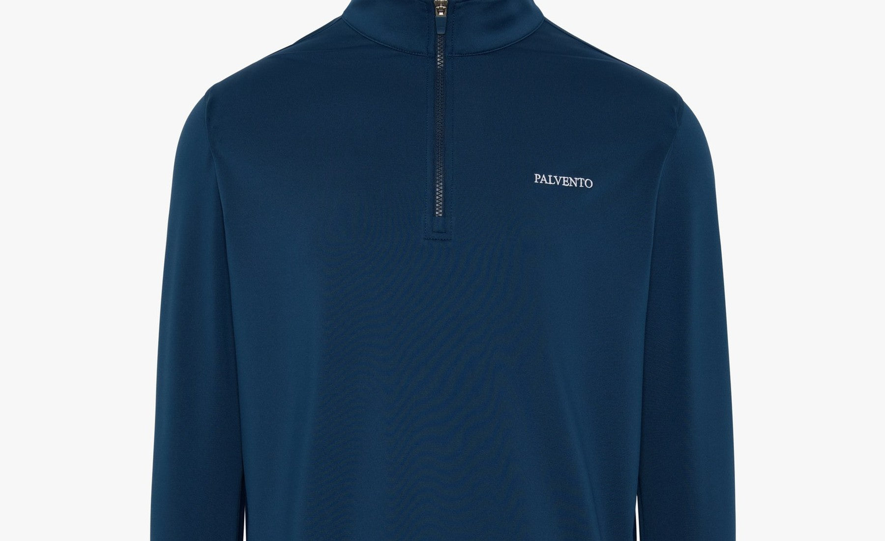 Navy Palvento performance quarter zip illustrating refined off-course golf style
