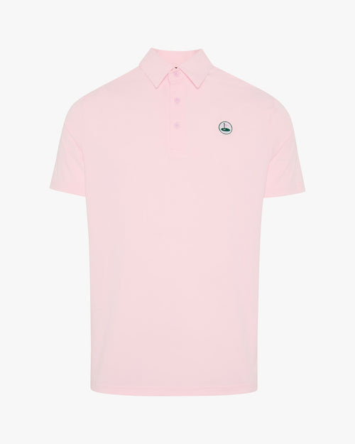 The Brancaster pink performance golf polo by Palvento, front view
