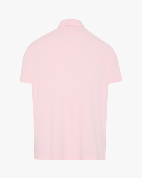 The Brancaster pink performance golf polo by Palvento, back view