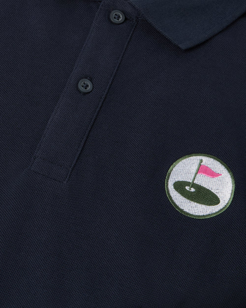 navy polo front with Palvento logo up close