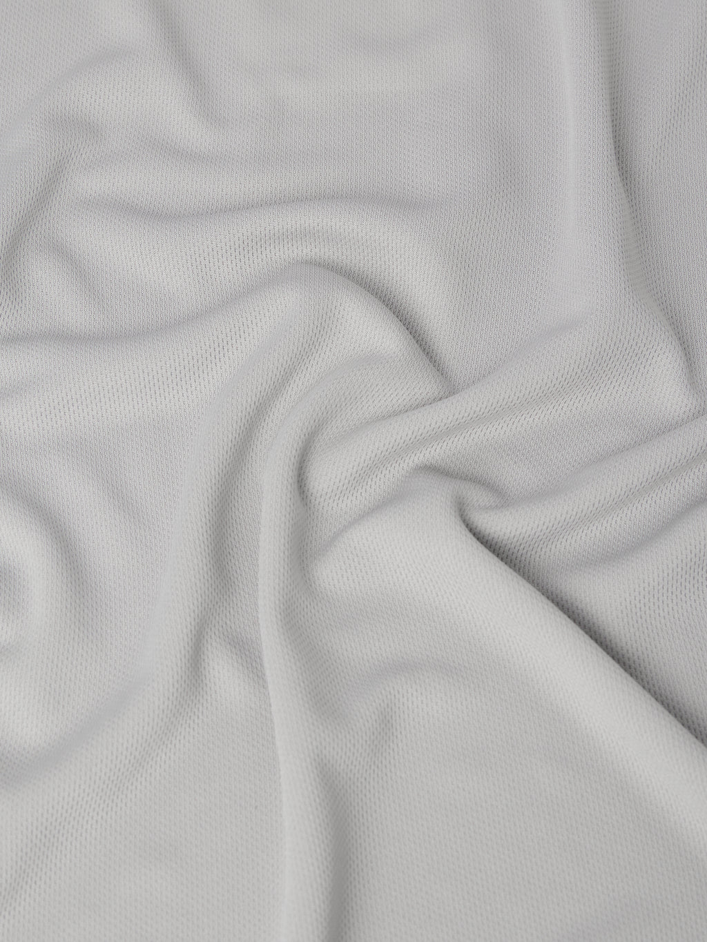 Close-up of gray fabric with a textured pattern