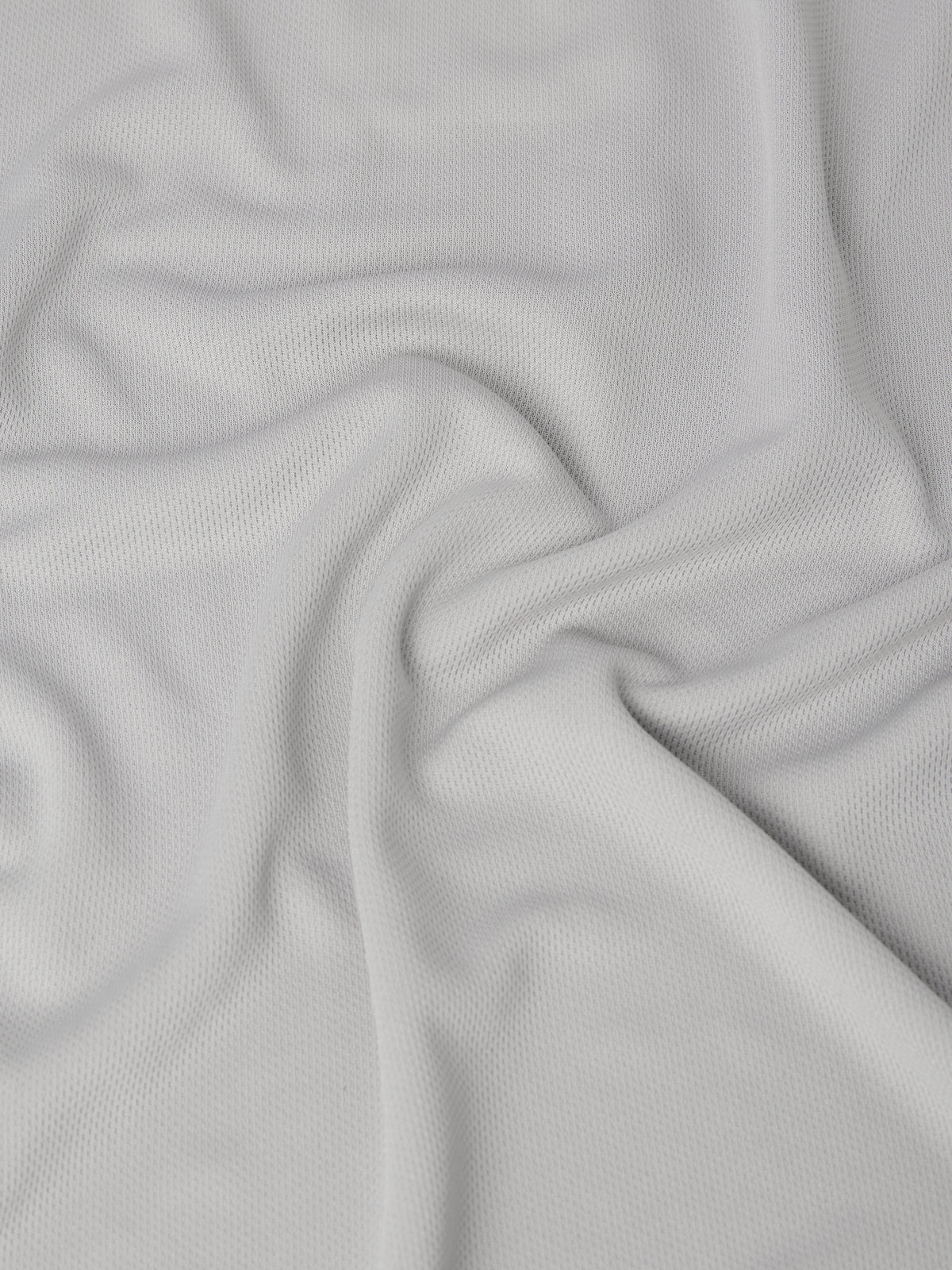 Close-up of gray fabric with a textured pattern
