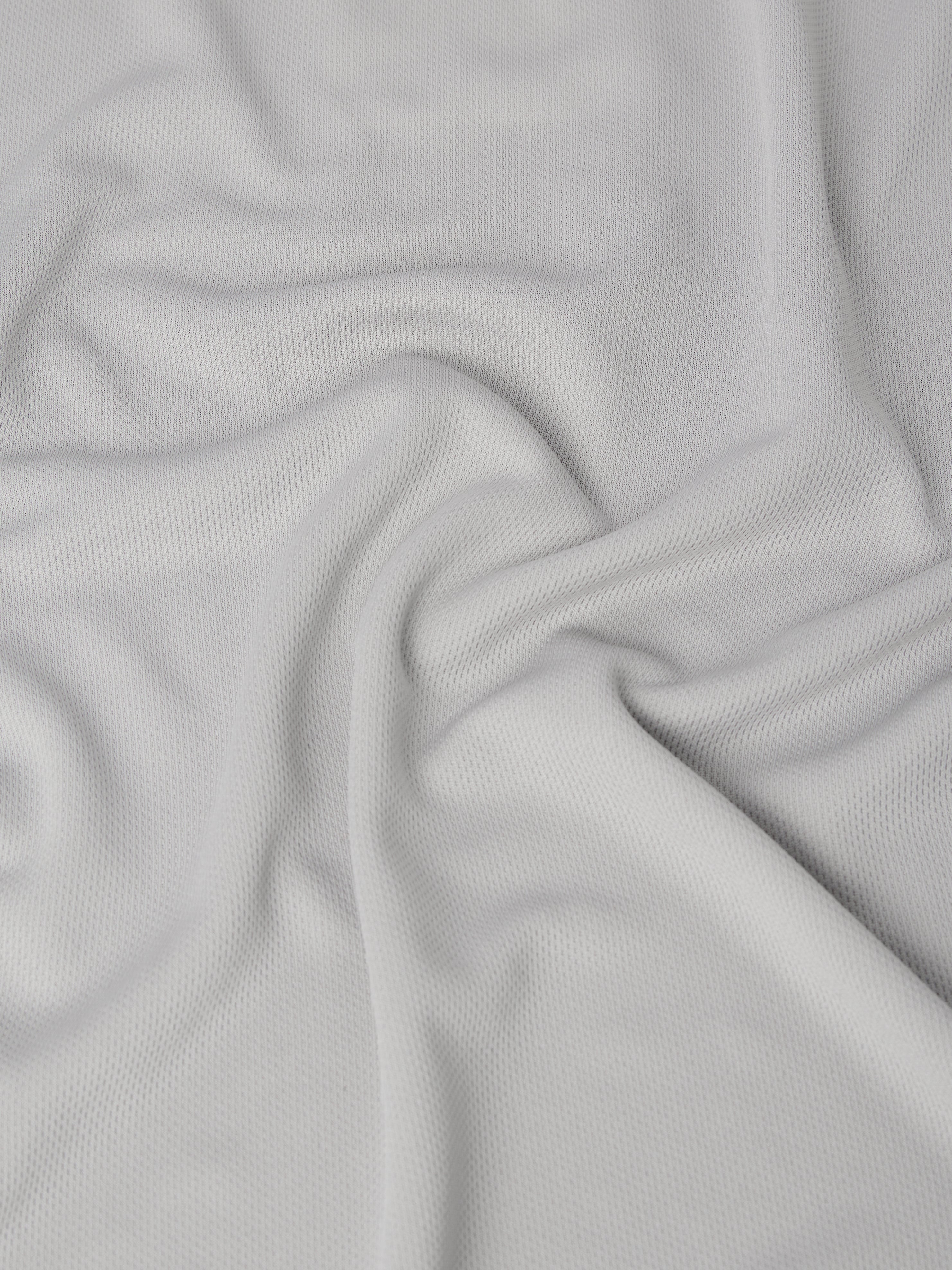 Close-up of gray fabric with a textured pattern