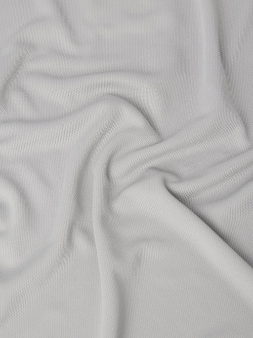Close-up of gray fabric with a textured pattern