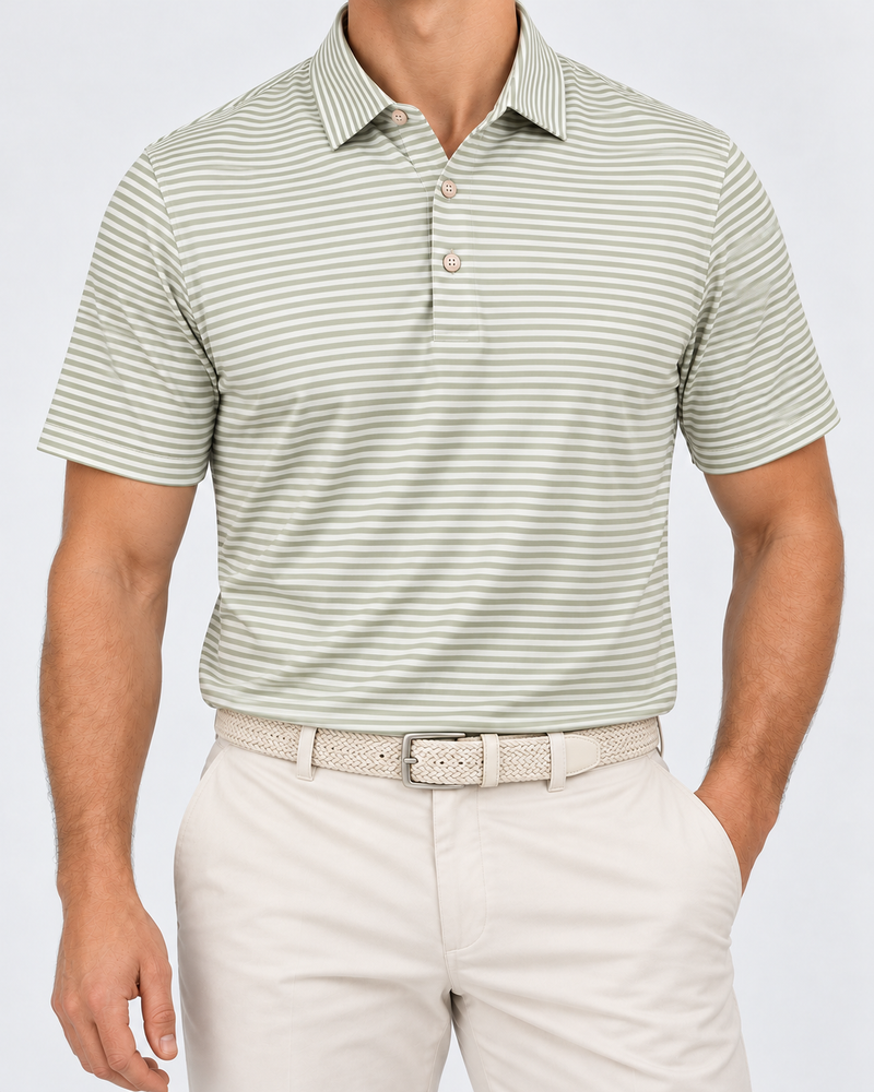 Front model view of the green striped Heathland polo with embroidered Palvento roundel, cream chinos and woven belt.