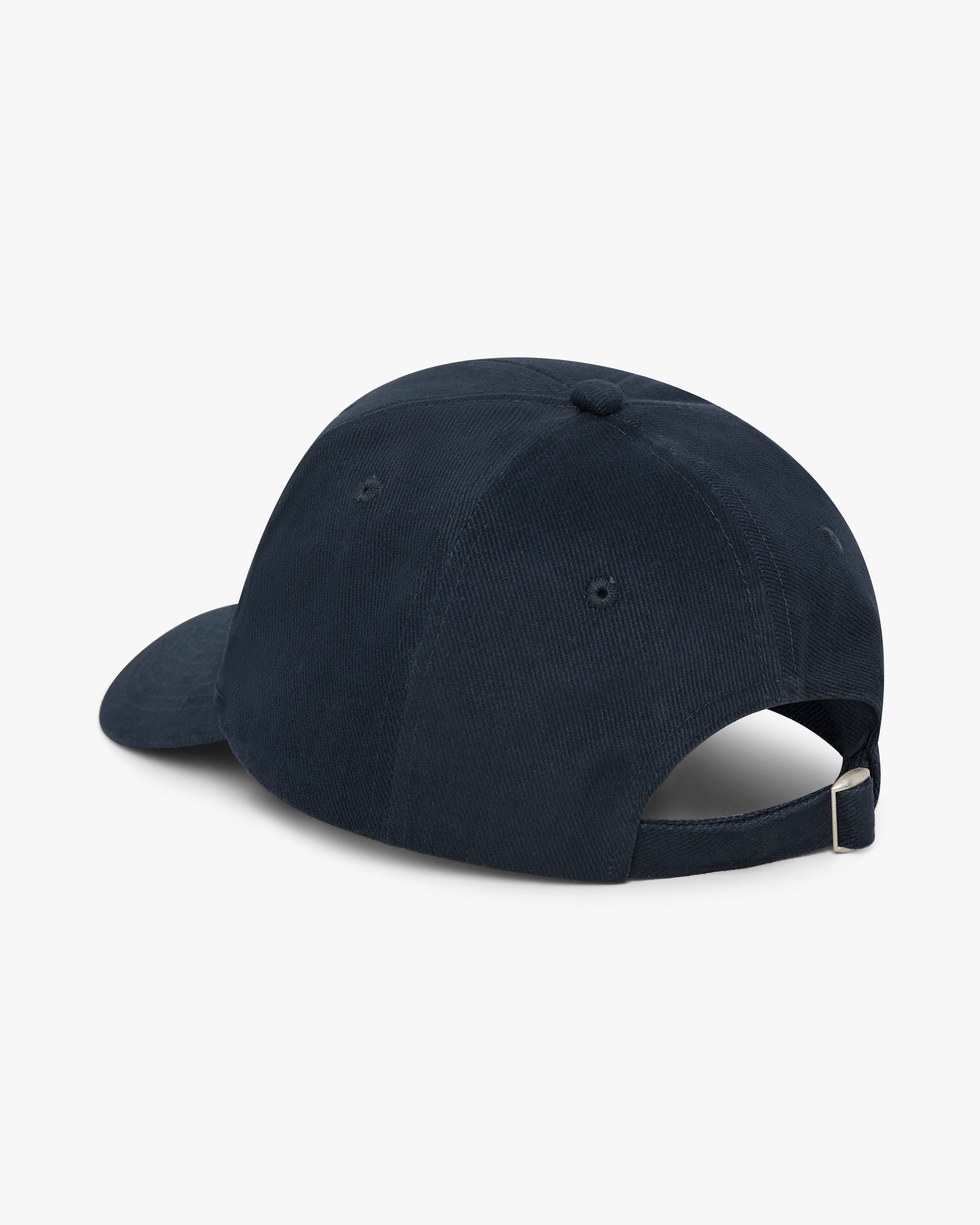 Navy golf cap on a white background
